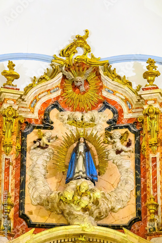 Medieval religious saints on an altar inside the Saint John of God Church (Century XVIII) in Murcia, Spain 