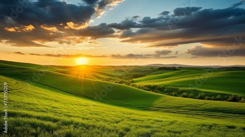 Peaceful countryside scene with rolling hills and a stunning sunset
