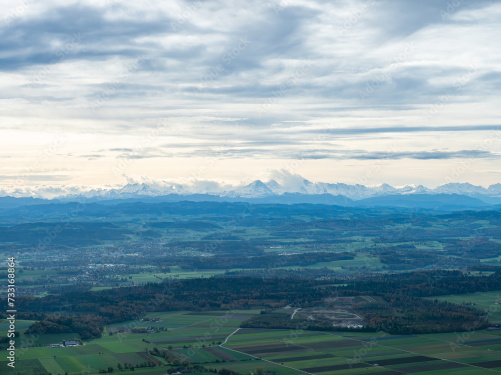 Roggenflue, Switzerland - October 29th 2023: View from the Jura mountains towards the Swiss Alps.