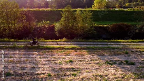 moped in the golden hour on a gravel path