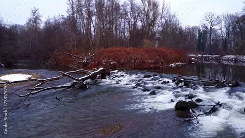 river in winter with rocks