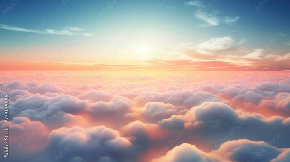 Aerial view of Beautiful sunrise sky above clouds or fog with dramatic light at dawn.