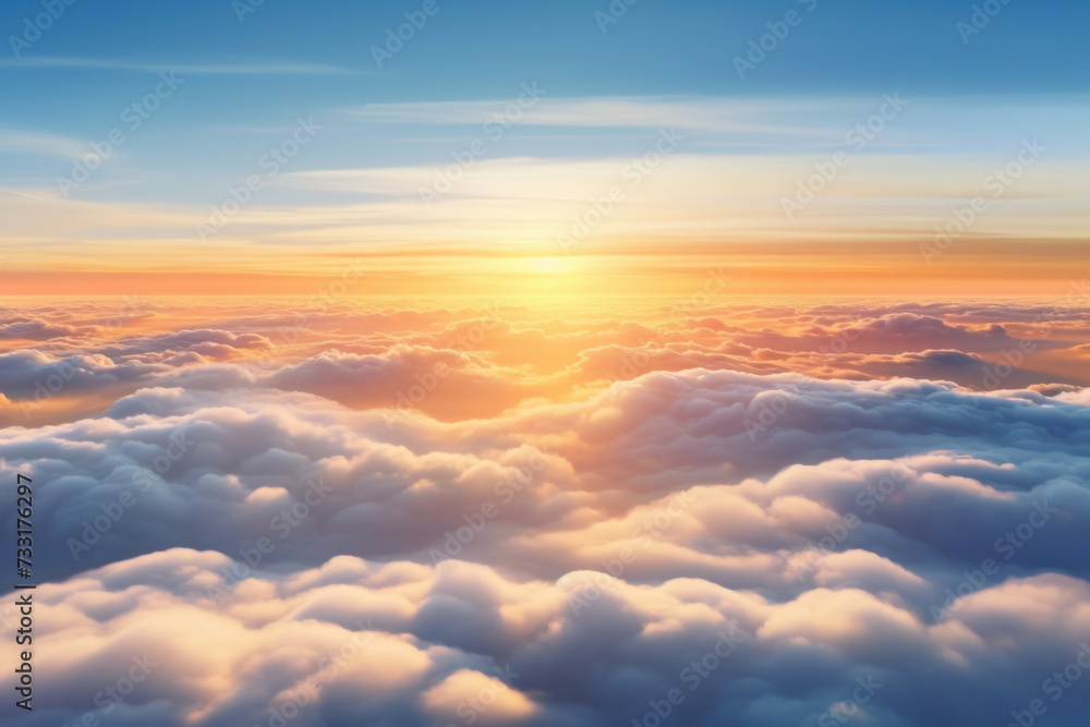 Aerial view of Beautiful sunrise sky above clouds or fog with dramatic light at dawn. Aerial view of Beautiful sunrise sky above clouds or fog with dramatic light at dawn.