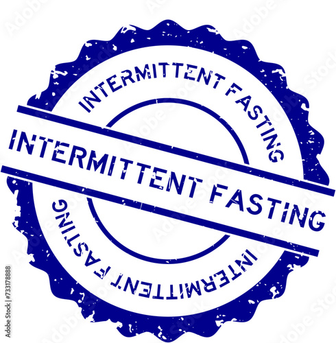 Grunge blue intermittent fasting word round rubber seal stamp on white background