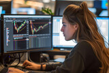 Female trader working on computer, analysis and research data for invest in stock and currency market