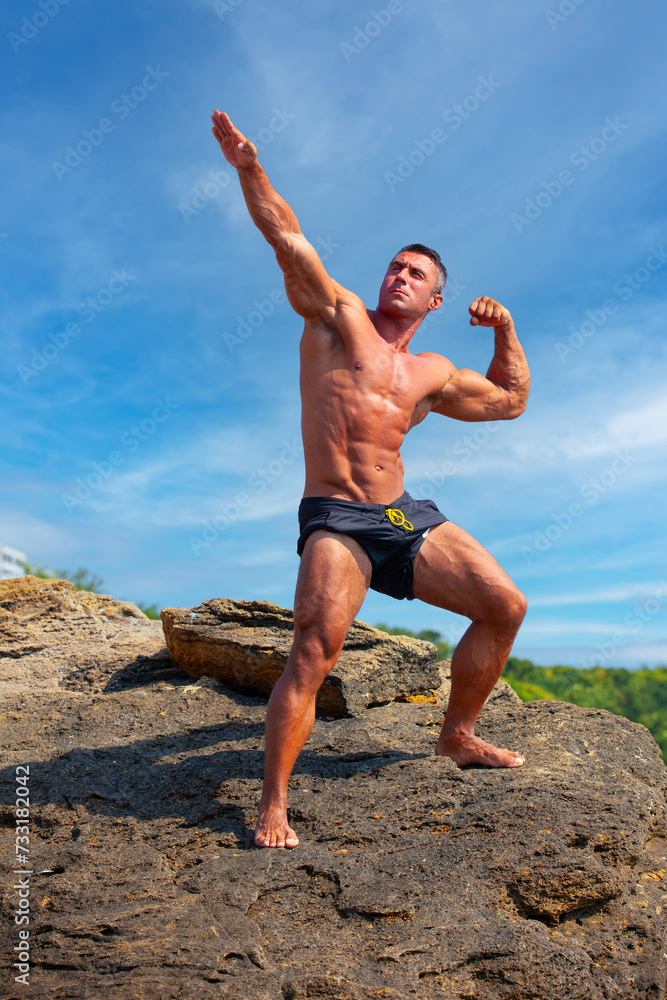 Sports guy on the beach in the summer season Sports guy on the beach in the summer season