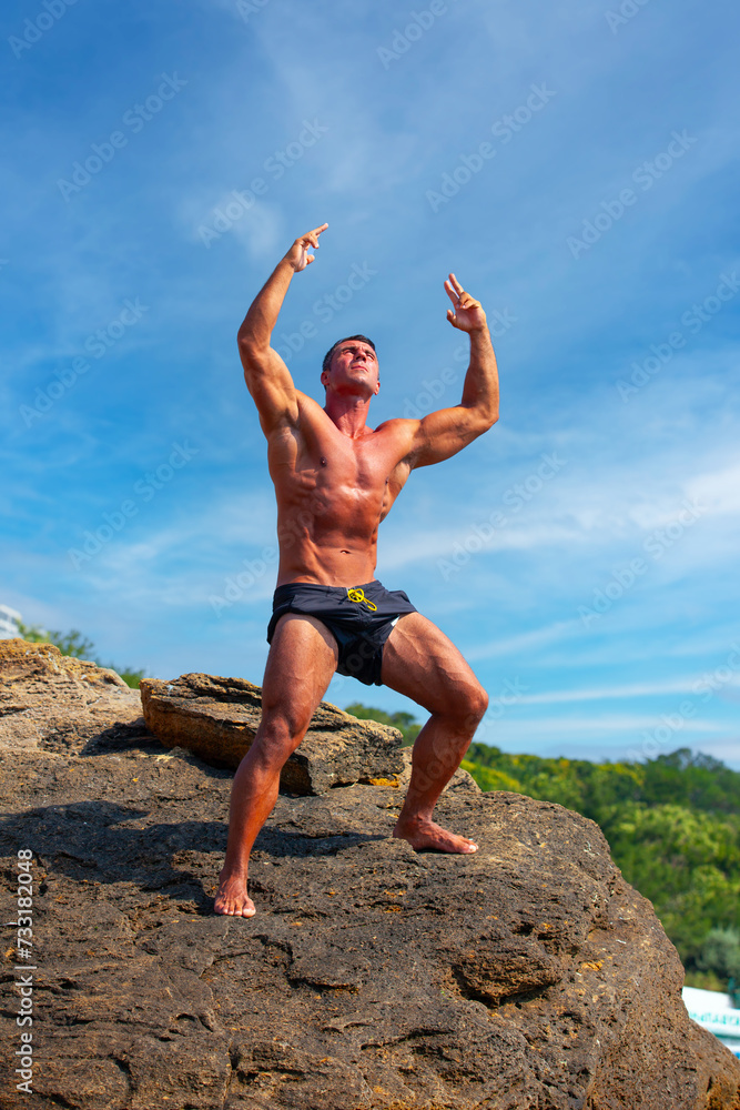 Sports guy on the beach in the summer season Sports guy on the beach in the summer season