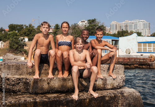 Group of children on the seashore during vacation