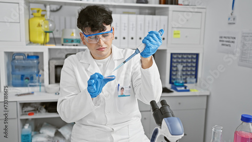 A man in a white lab coat meticulously pipetting liquid into a test tube in a well-equipped laboratory.