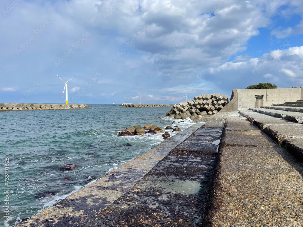 Offshore wind turbines on the coast of Toyama Bay in Japan