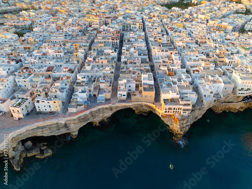 The city of Polignano a Mare during sunrise. Aerial view. Puglia, Italy.