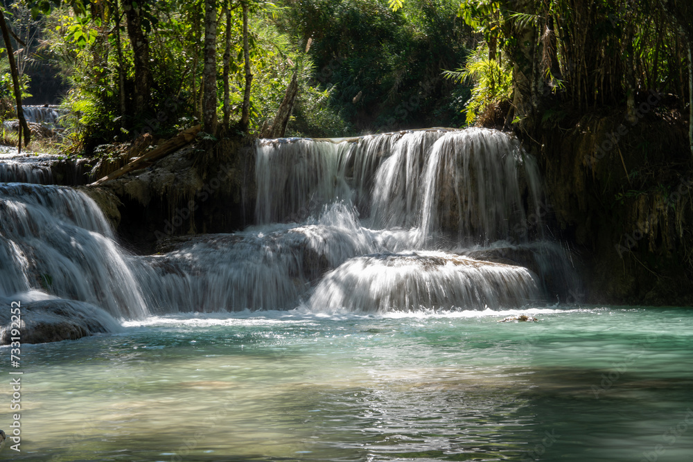 The Kuang Si Waterfall is located 30 km to the south of Luang Prabang in the Southeast Asian country of Laos. The Kuang Si Waterfall is located 30 km to the south of Luang Prabang in the Southeast Asian country of Laos.