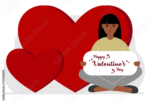 A woman holds a Happy Valentine's Day greeting against a background of red hearts.