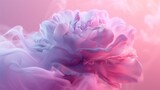 A violet floral smoke isolated on a pink background. The smoke looks like a flower, fragrant and beautiful everything it blooms. 