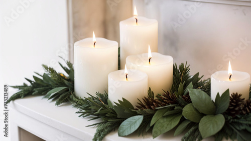 five candles among green leaves