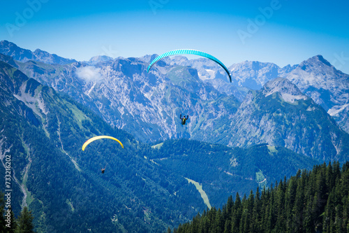Paragliding in the mountains of Tyrol , Austria, Europe 