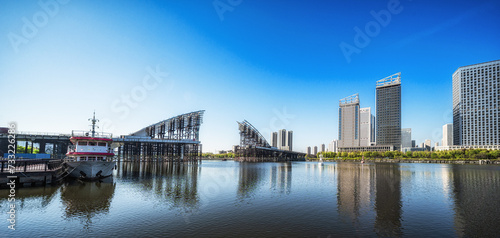 Panoramic View of Urban Skyline by the Waterfront