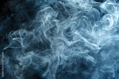 A thick blue swirling smoke pattern in front of a black background/drifting smoke overlay or texture.