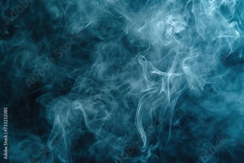 A thick blue swirling smoke pattern in front of a black background/drifting smoke overlay or texture.