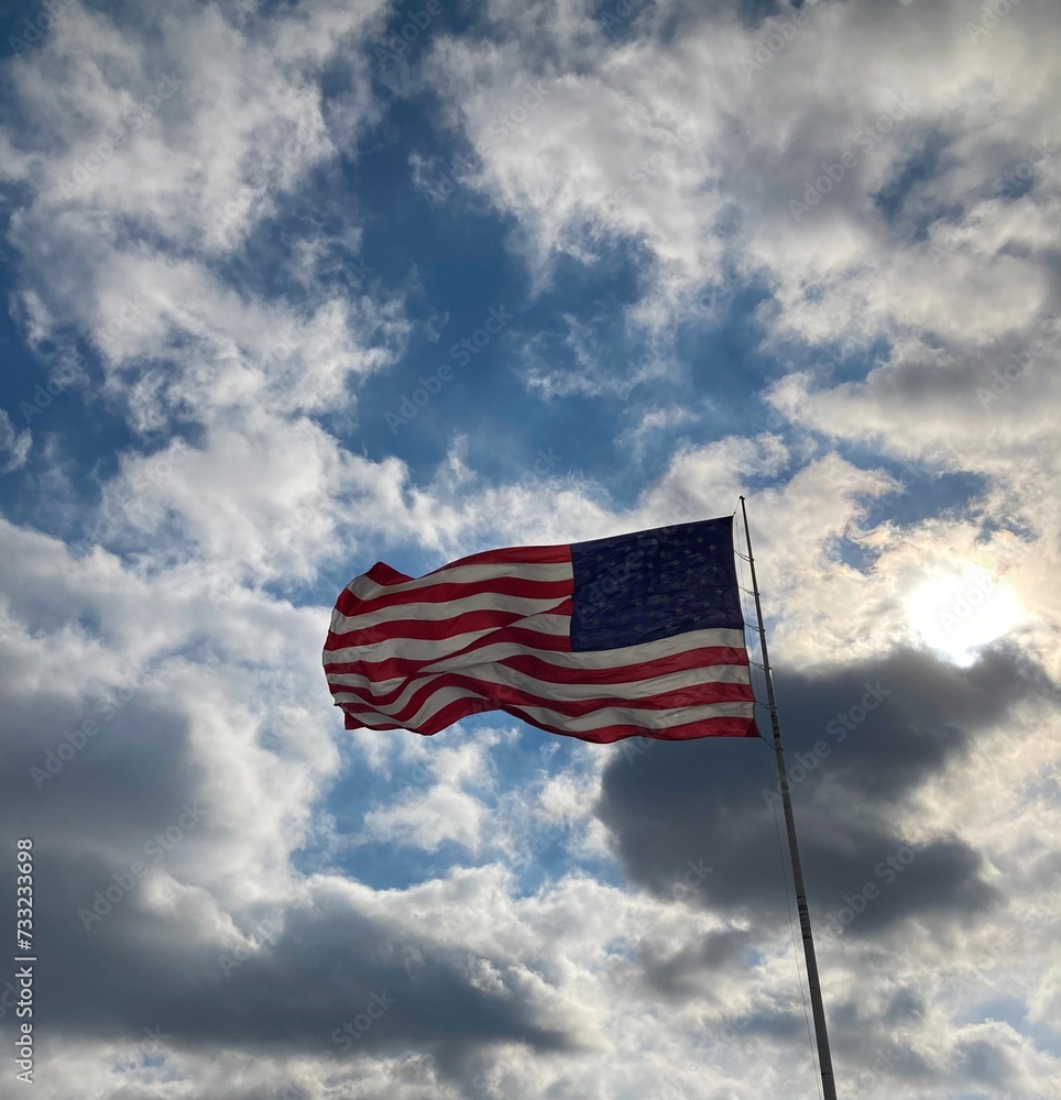 Fototapeta premium American flag waving in wind
