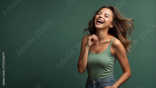 gorgeous woman laughs on minimal green HDR background, woman smile  model fashion, hair model, makeup artist, beauty eyes, soft skin, healthy, womans day © Orod