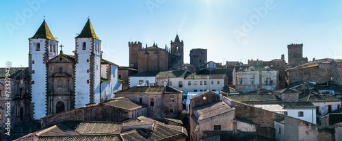 Cityscape of the medieval town of Caceres on a sunny day with blue skies, Spain. photo