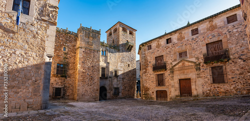 A group of old stone houses in the medieval town of Caceres, Spain. photo