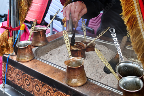 Ember Turkish coffee. Roasted Turkish coffee. Traditional nubian coffee making. Coffee turk on the coal. photo