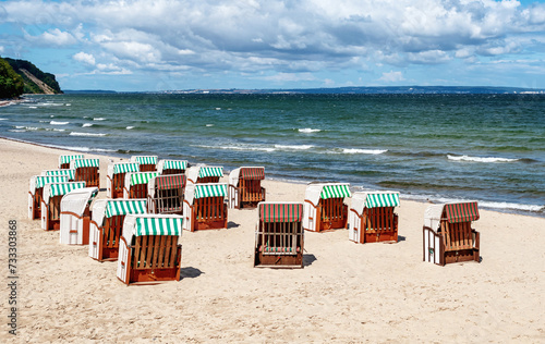Beach chairs at the Baltic Sea . Pier of Sellin at Ruegen Island, Germany. photo