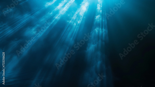 blue light rays coming on to a dark black background  © SD2