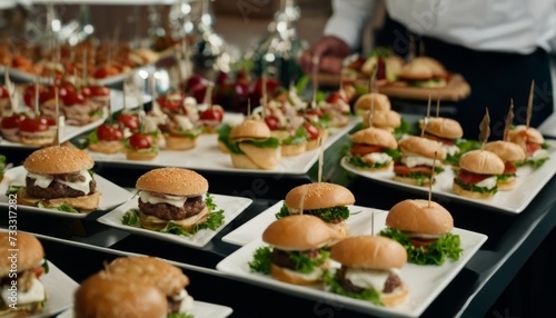 A table full of sandwiches and appetizers