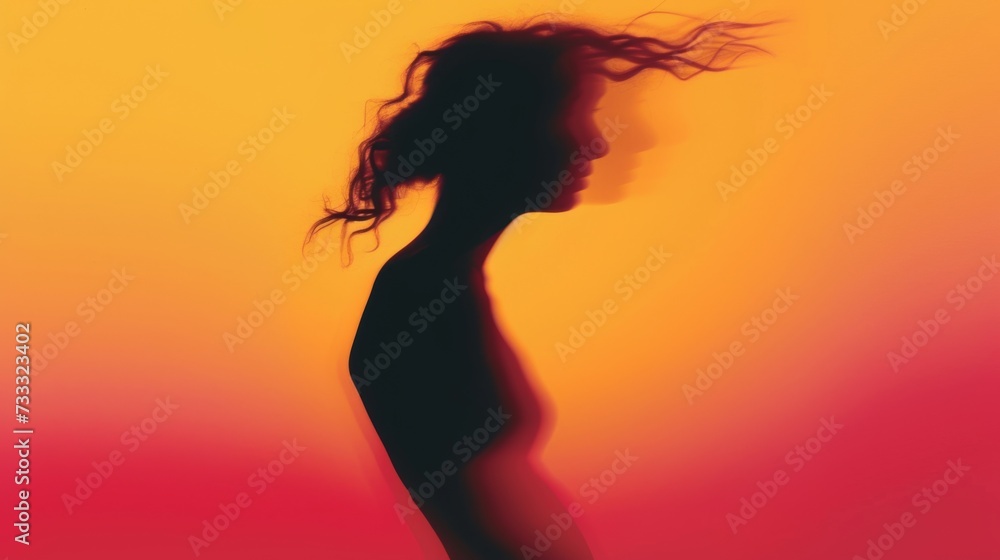Female blurred silhouette on a orange background. Elegant outline of a woman in motion out of focus Female blurred silhouette on a orange background. Elegant outline of a woman in motion out of focus