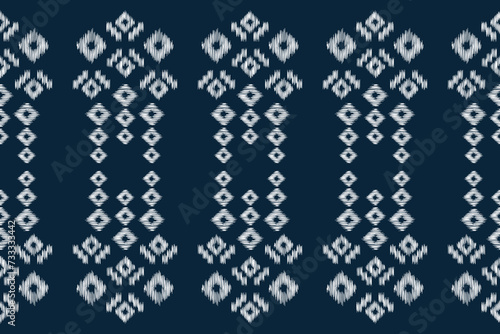 Traditional Ethnic ikat motif fabric pattern geometric style.African Ikat embroidery Ethnic oriental pattern blue background wallpaper. Abstract,vector,illustration.Texture,frame,decoration.