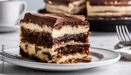 A slice of layered cake on a plate