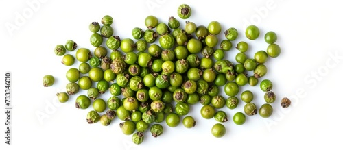 Vibrant Display of Some Green Peppercorns on an Isolated White Background - Some, Green, Peppercorns, Isolated, White, Background photo