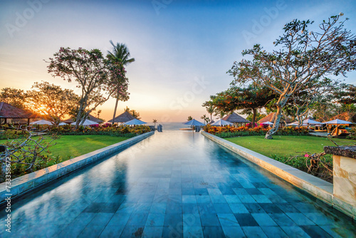Swimming pool at sunset in Bali, Jimbaran photo