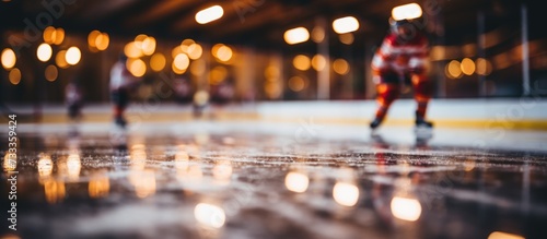 Close up of ice hockey stick on ice rink photo