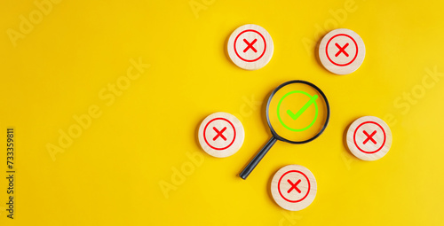approval, approved, check, checkmark, choice, choose, confirm, correct, cross, decision. put magnifying a middle right, wrong marks on yellow background color, concept of choice without people photo