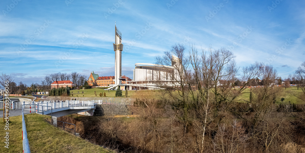Krakow, Poland . Sanctuary of  Saint Fautsine and Church of Divine Mercy. Park and bridge over Wilga river. Winter panorama
