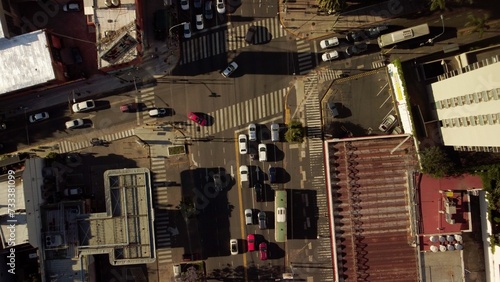 Cars traffic at crossroads. Auto road transport in city  top aerial view.