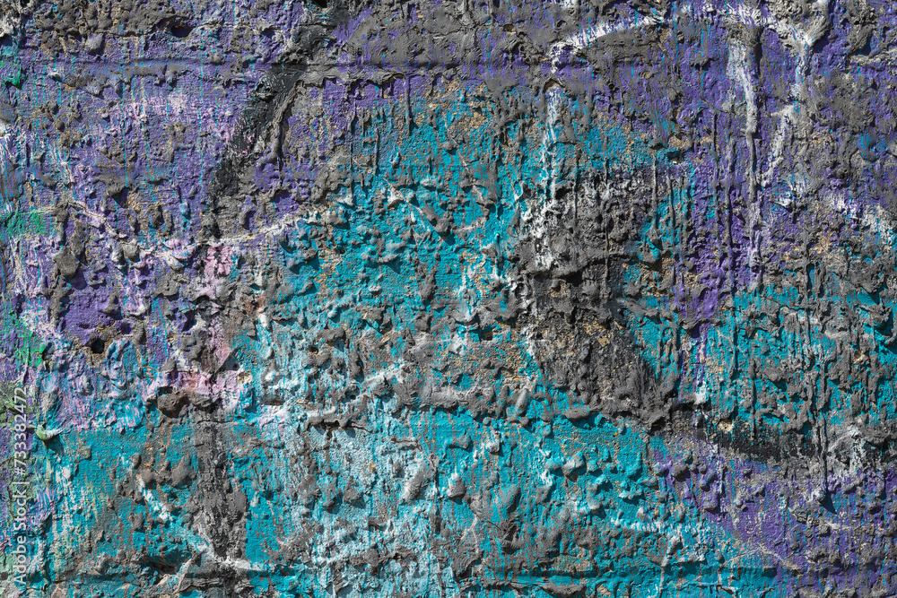 Obraz premium Mixed shades of cyan, black and purple colour dripped paint on old concrete wall background. Natural paintbrush strokes and textured rough cement