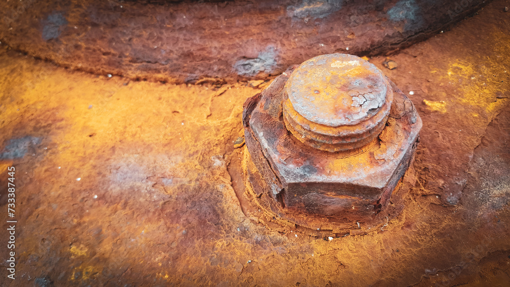 In the harbor, a rusty bollard In the harbor, a rusty bollard