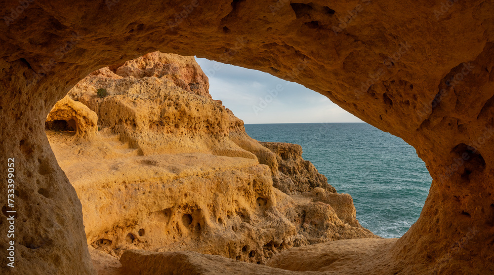 Surreal seascapes with natural caves, tidal pools and trails in the Algar seco cliffs, Carvoeiro, Lagoa, Algarve, Portugal.