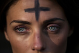 Woman with cross made from ash on forehead. Ash wednesday, faith, religious ceremony concept