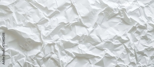 White Crumpled Paper for Background: A Crumpled, White Paper Seamlessly Creates a Versatile Background.