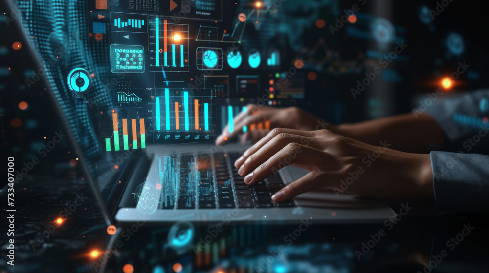 person's hands are seen typing on a laptop keyboard, with futuristic digital graphics of charts, graphs, and data analytics floating above the computer screen.