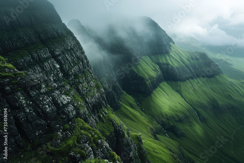 photo of a high and low angle with a mountain and a valley