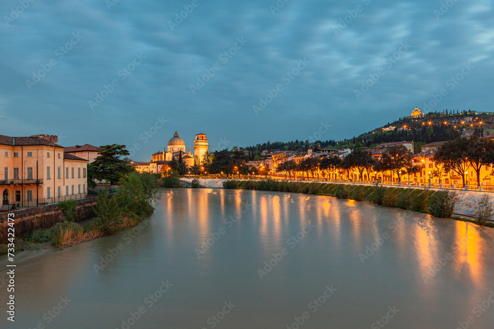 The Adige River overflows in the center of Verona after rains. Veneto, Italy, Europe.