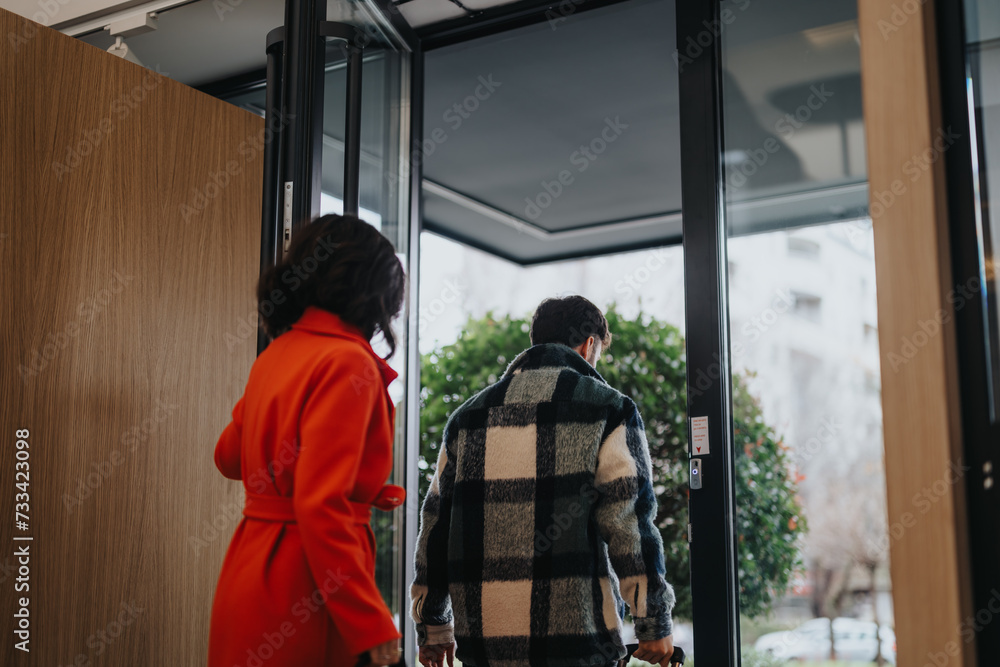 Two business colleagues in stylish attire walking and talking on a cloudy day. Two business colleagues in stylish attire walking and talking on a cloudy day.