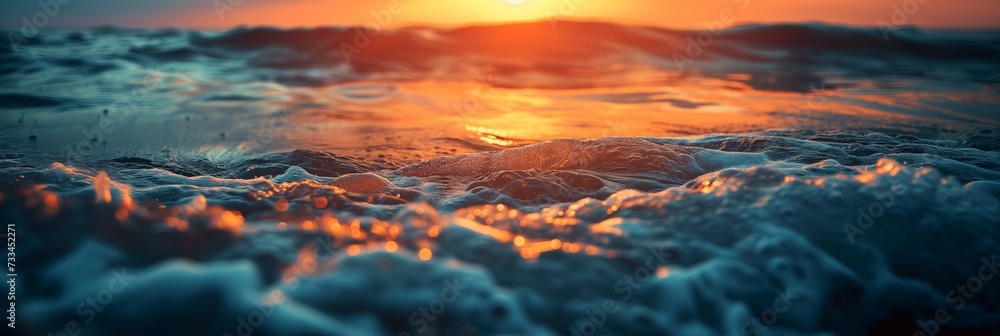 sunrise over the waves in the sea